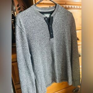 Grey Roots sweater with buttons.